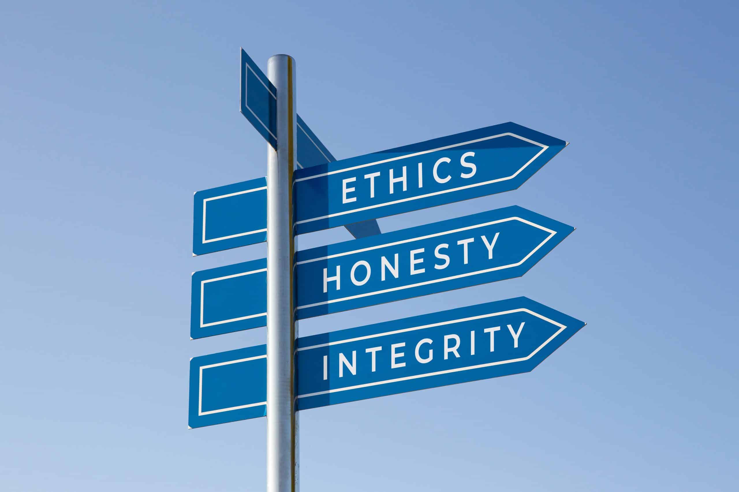 Signpost with ethics, honesty, integrity directions